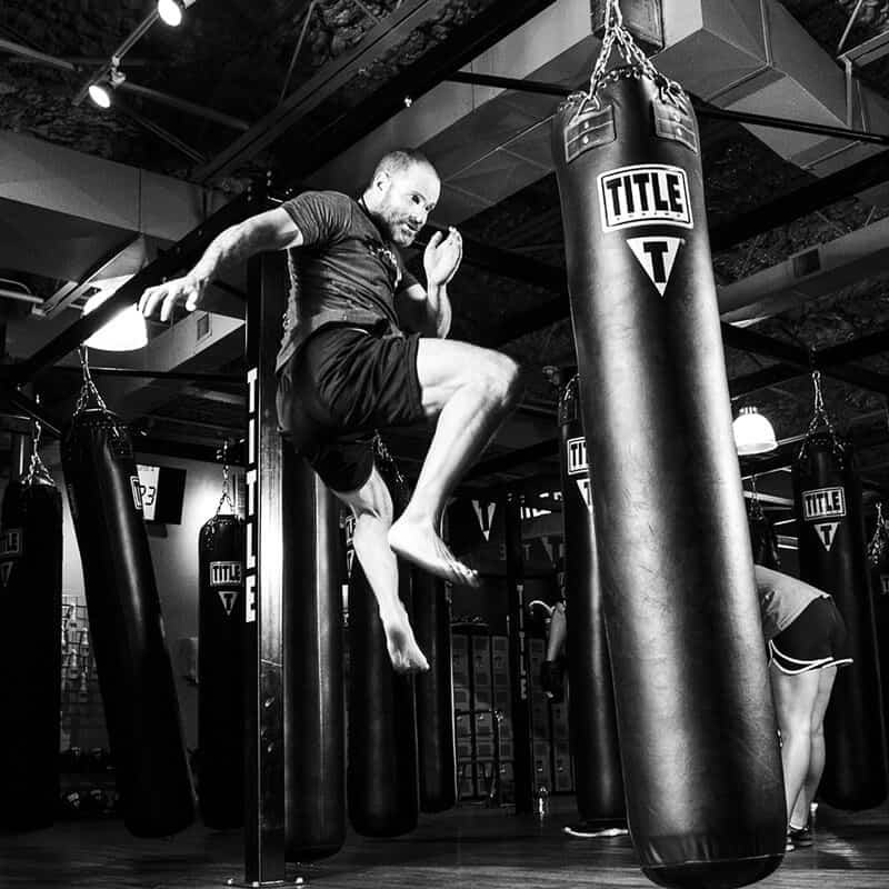 Mixed Martial Arts Lessons for Adults in Lenexa KS - Flying Knee Black and White MMA